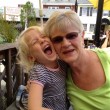 Sewinit's Karen Curcio getting a silly hug from one of her grandchildren
