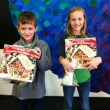 Emma and Connor with some of their art projects.